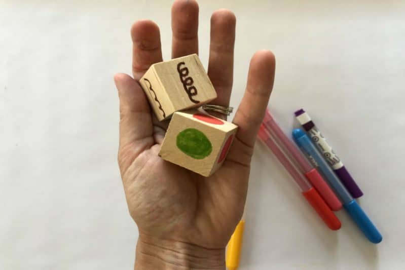 Make DIY Art Dice for a pre-writing art game perfect for preschoolers.
