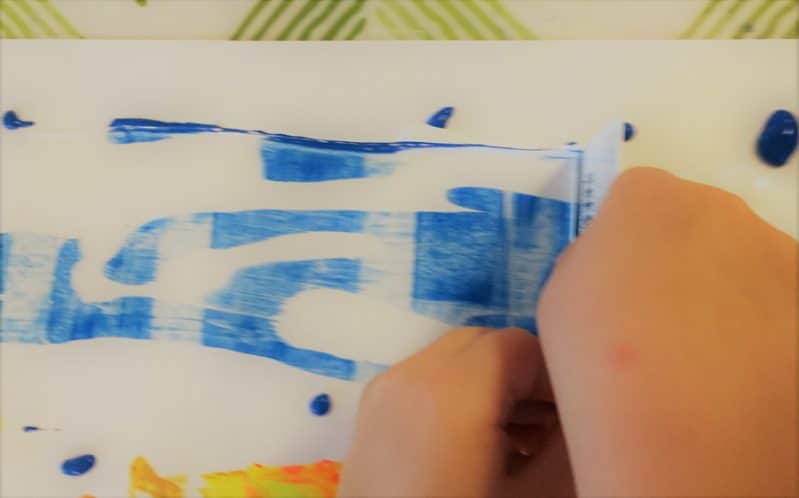 Create a colorful Fall painting with this easy Autumn landscape art tutorial. This scrape painting technique is simple enough for toddlers and preschoolers!