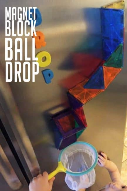 Keep your kids busy in the kitchen with this simple magnet block ball drop! This engineering and building activity encourages problem solving and fine motor skills. Your child will love this easy ball drop activity!