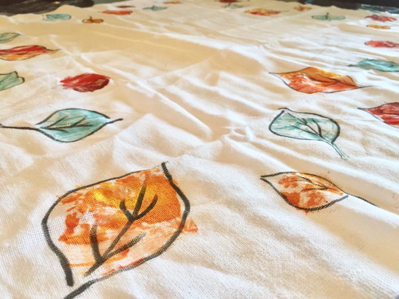 Make a colorful leaf stamped tablecloth! Your kids will love creating their very own tablecloth for Thanksgiving.
