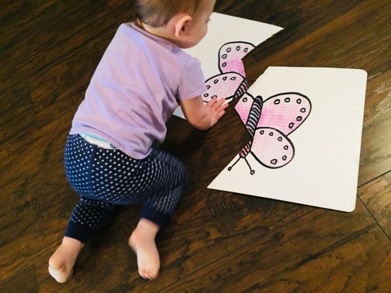 Does your child love puzzles? They'll love making their own puzzle with this DIY cardboard puzzle for toddler and babies!