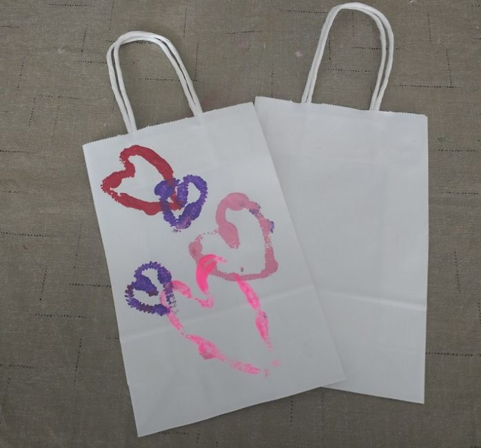 Valentine's Day goody bags with stamped heart designs