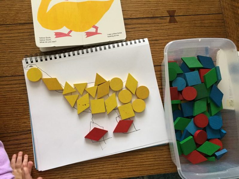 This art project for kids uses colorful tangram blocks and inspiration from Eric Carle to create fun abstract art!