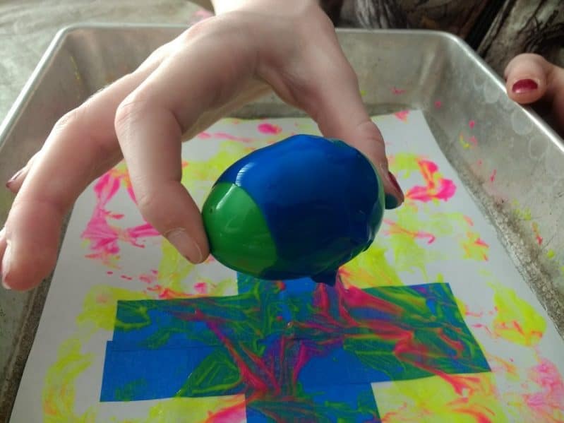 Try different painting techniques using plastic Easter eggs!