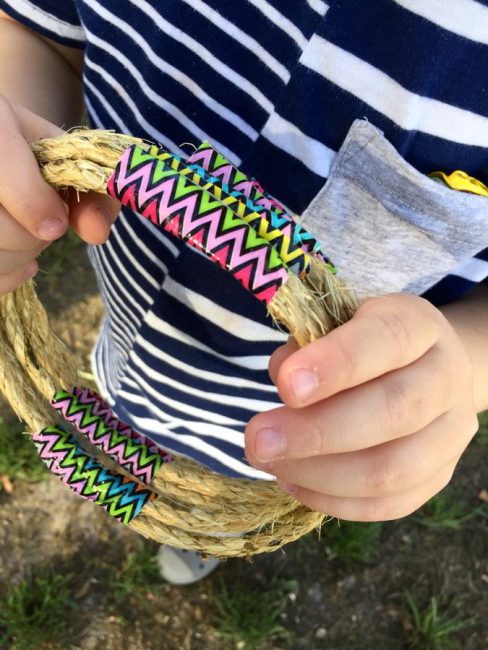 Make this simple DIY nature ring toss game! This outdoor play idea is simple and fun!