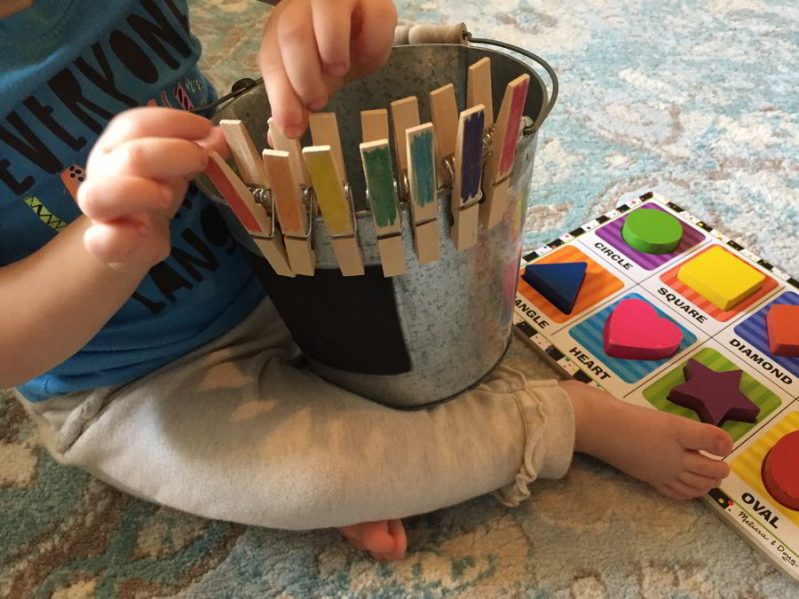 Explore color matching with a clothespin game for toddlers!