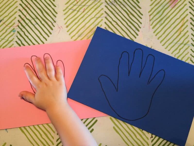 Trace your child's hand onto foam.
