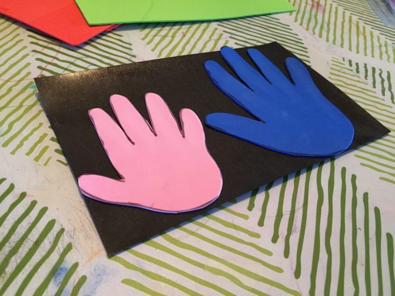Add magnetic sheets to the back of your handprints.
