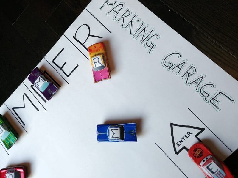 Make your own DIY toy garage to practice matching skills with any new content your child is learning!