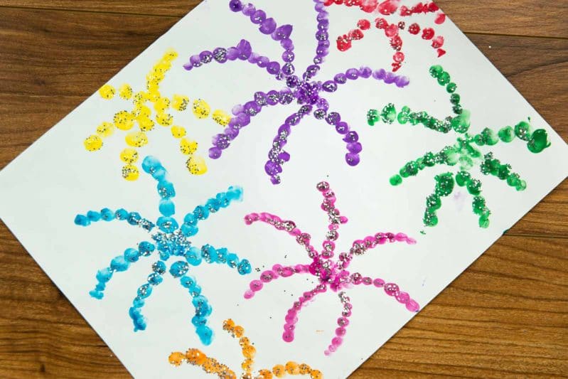 Make your own finger painted fireworks! Add glitter for extra fun!