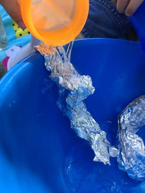 What are all the different ways that you can pour water over tin foil? Count all the cool ways your child plays with this fun activity!