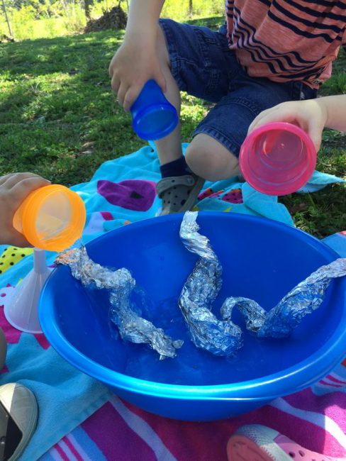 This tin foil water play activity is so fun! Your kids will love this easy idea for summer play.
