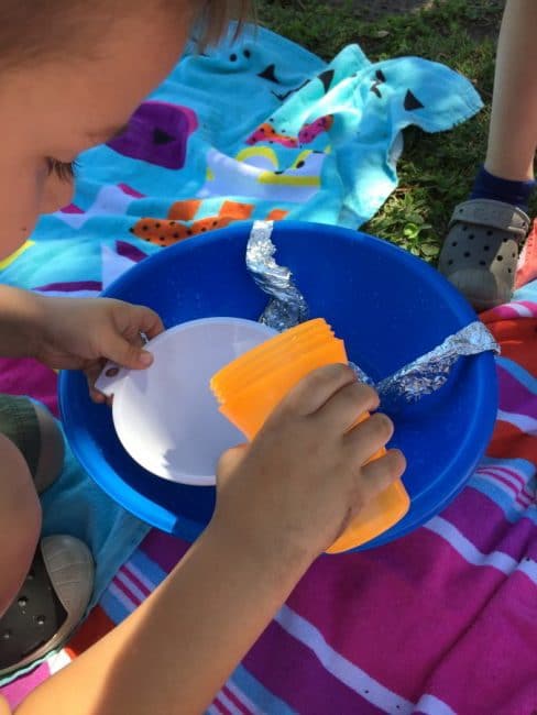 This tin foil water play activity is so fun! Your kids will love this easy idea for summer water play.