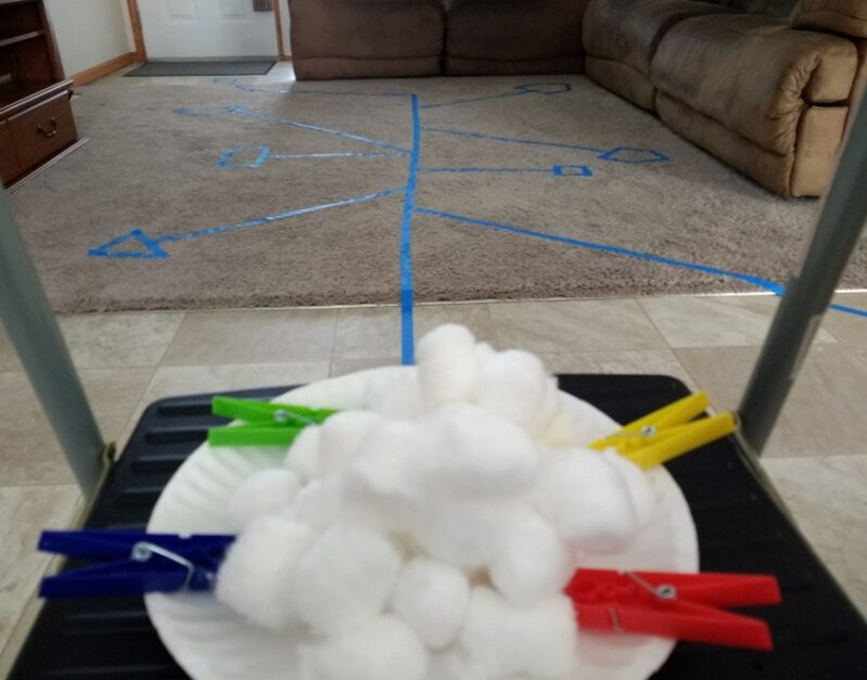 Set up a cotton ball transfer challenge for your kids with a few "always on hand" supplies!