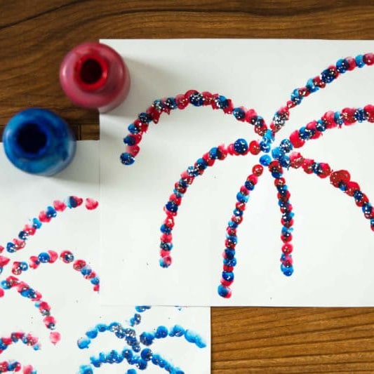 Finger paint a pretty fireworks show with your kids for the 4th of July!