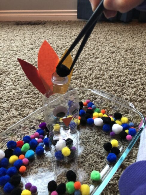 Work on fine motor skills with a simple Thanksgiving game for kids
