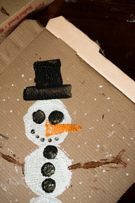 Try a fun recycled snowman painting project for kids this winter!