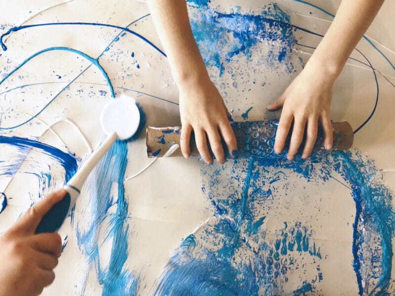 Roll and scrub to your make winter big art painting project super sensory!