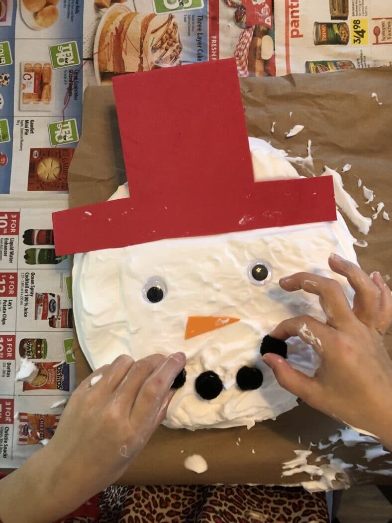 DIY a snowman inside with shaving cream sensory foam!