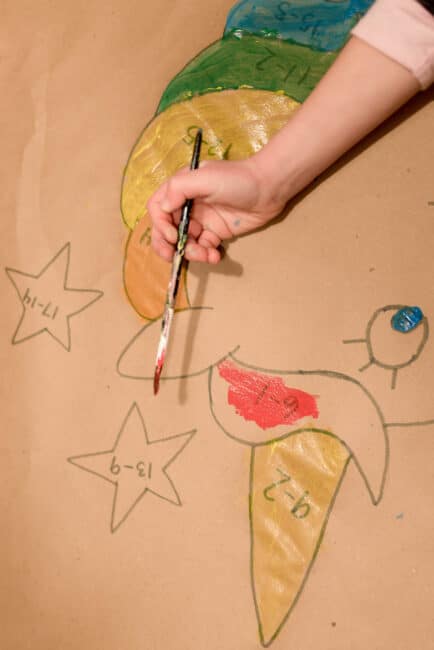 We loved this super simple DIY paint-by-math art activity for kids!