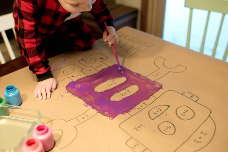 This simple painting activity also works on early math skills, like number recognition, addition, and subtraction