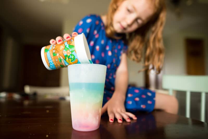 Practice pouring carefully in this easy rainbow science experiment that kids can do!