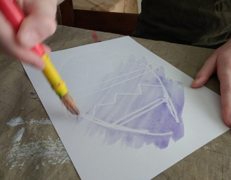Paint with watercolors for a fun Easter-theme crayon resist activity that kids will love!