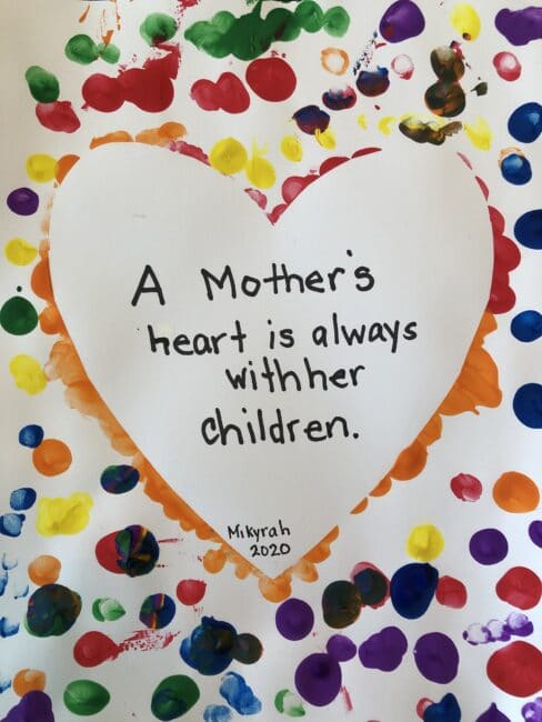 A mother's heart is always with her children quote to add to a fingerprint heart card the kids make for Mother's Day.