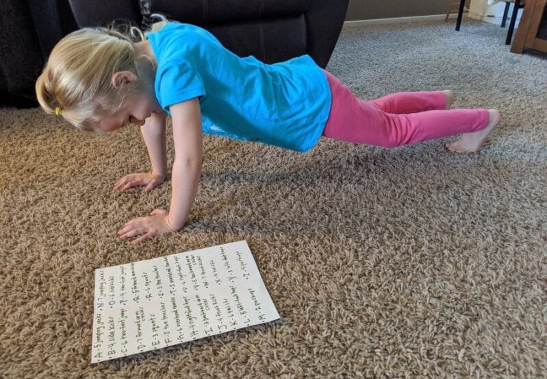 We love to spell with a fun workout-style literacy game for kids!