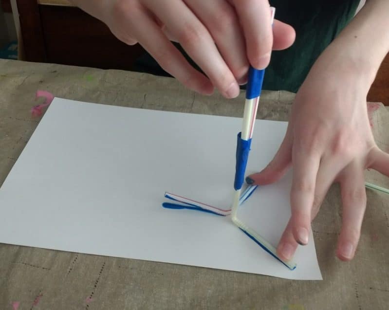 Stamping the straws onto paper