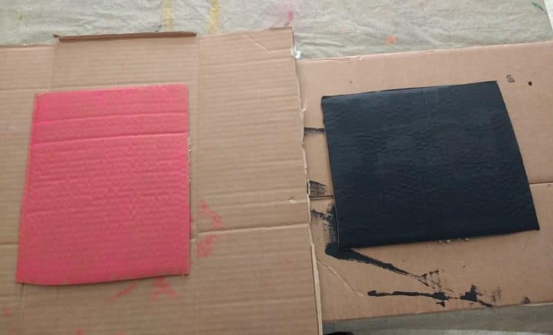 prep cardboard by painting it to make some string art