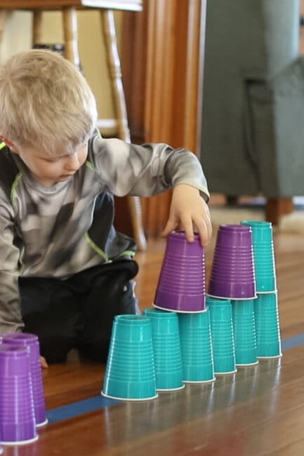 keeping toddlers busy with plastic cups