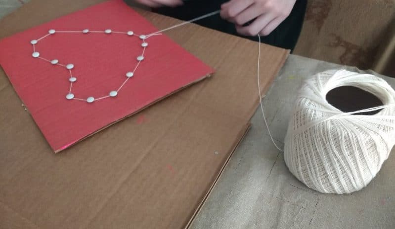 String art can be simple or intricate, your child can choose how to do it! Just trace the shape with the string, or criss cross between.