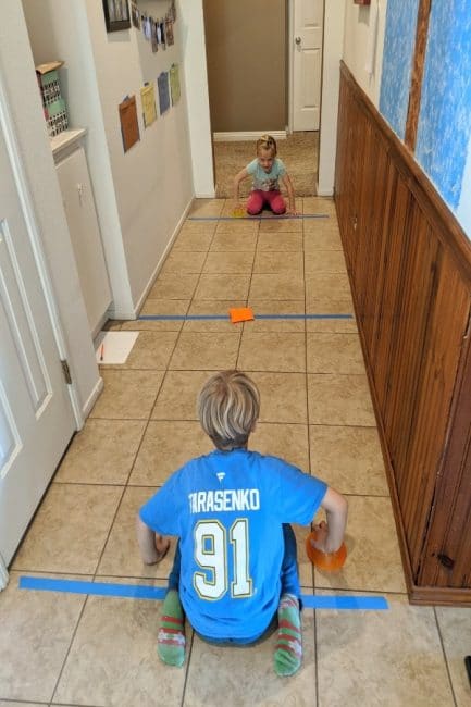 Score! Get moving and having fun with this super simple indoor hall hockey activity. It's super easy to set-up this new way to play hockey at home!