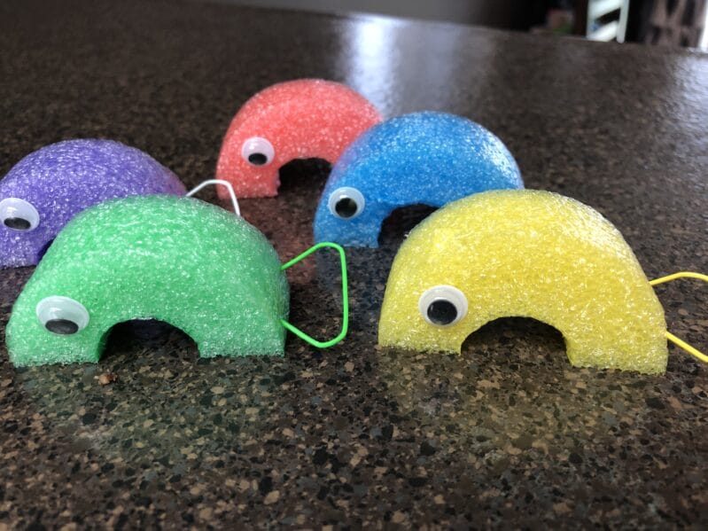 Pool noodle fishes with paper clip tails for fishing