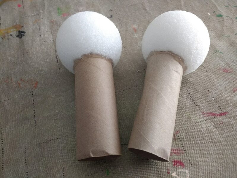Glue Styrofoam balls to toilet paper rolls to make your own simple microphone craft.