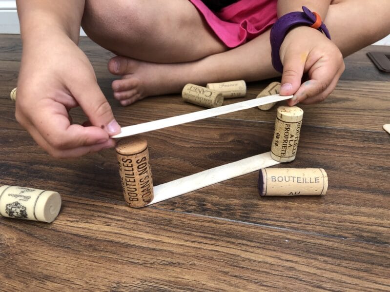 We've put together a collection of wine cork activities for kids. Like this one: Cork and Popsicle Stick Building.