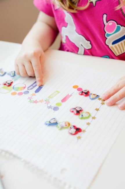 Sticker name trace activity for toddlers.