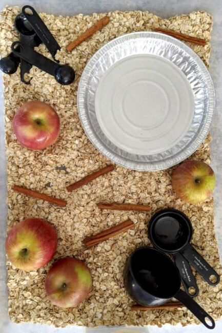 The sweet smell of apple pie can cheer up anyone's day. This simple and sweet apple pie sensory bin provides the yummy smell without the need for baking.