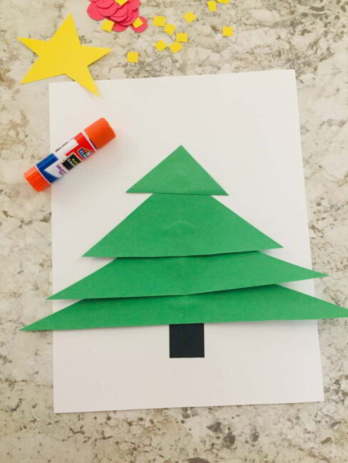 Make this simple Christmas tree shapes craft to celebrate the season!
