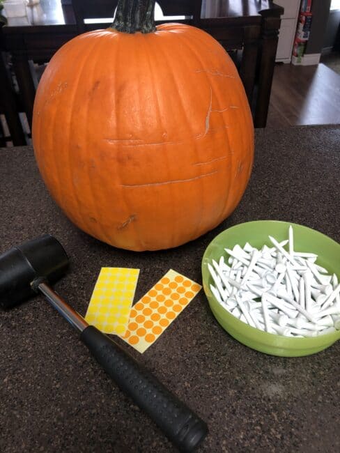 Supplies needed for Pumpkin Letters Hammering activity.