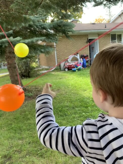 Balloon rocket science experiment for kids. super simple and fun.