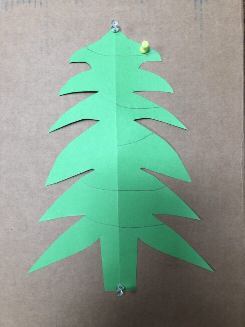 use push pins to decorate a Christmas tree for fine motor skills and color sorting or patterns