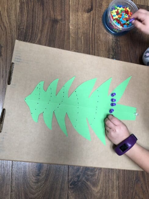 Christmas tree fine motor activity is great for sorting colors and making patterns too.