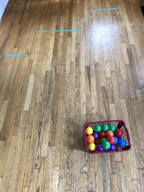 Super simple sticky line ball rolling activity for kids.