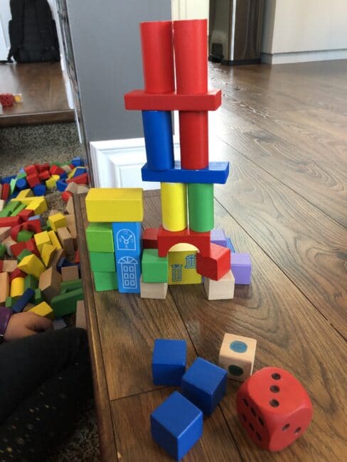 {pinterest-variation-3}
DIY block tower building into an educational activity for toddlers and preschoolers to work on fine motor and cognitive thinking as well as learning colors and even teach some counting and math!