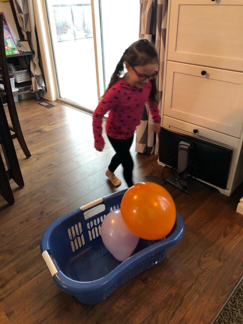 Let the dice lead the way with these super simple balloon game for kids plus work on math and counting along with gross motor fun!