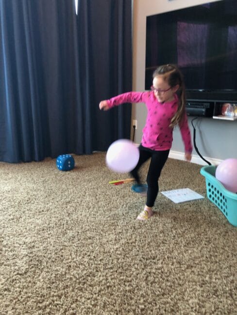 Kicking the balloons