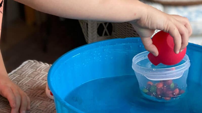 Super simple candy counting sink or float science experiment to learn counting and have some laughs! How many will it take to sink the boat?
