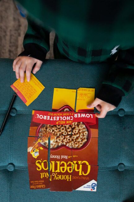 Turn a cereal box into a super simple DIY puzzle activity with a twist.